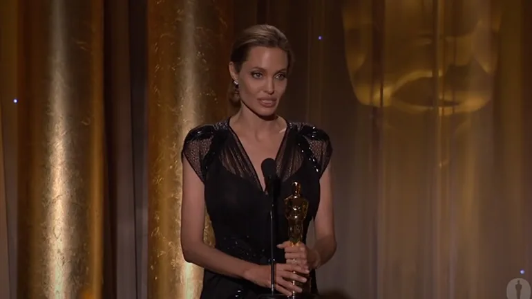 Angelina Jolie receives the Jean Hersholt Humanitarian Award at the 2013 Governors Awards-jpeg