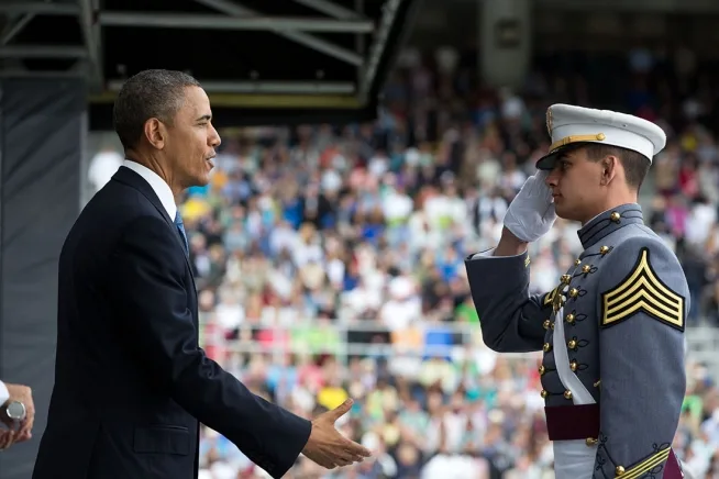 President Barack Obama greets graduating cadets at the United States Military Academy at West Point commencement ceremony at Michie Stadium in West Point, N.Y., May 28, 2014. (Photo by Pete Souza)