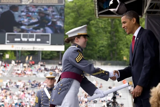 President Barack Obama hands out a diploma to one of the honor graduates of the U.S. Military Academy after delivering the commencement address at Michie Stadium in West Point, N.Y., May 22, 2010.